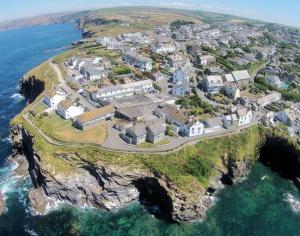 an aerial view of an island in the ocean at Castaway in Port Isaac