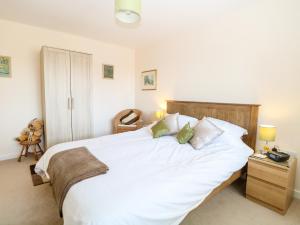 Ένα ή περισσότερα κρεβάτια σε δωμάτιο στο Flintstone Cottage +20 φωτογραφίες