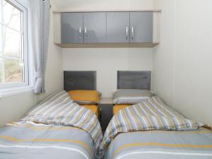 Кровать или кровати в номере Lakeside View