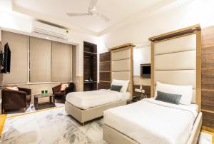 Postel nebo postele na pokoji v ubytování Hotel Star By Star Group- Near Delhi Airport
