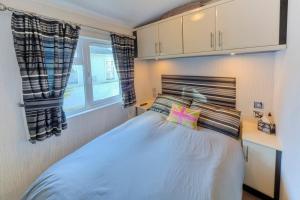 Postel nebo postele na pokoji v ubytování The Warren D7 + 9 fotografií