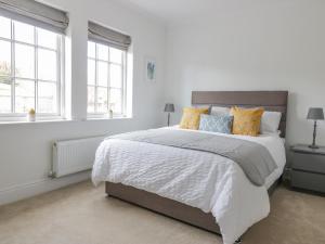 מיטה או מיטות בחדר ב-40 Bowmont Court
