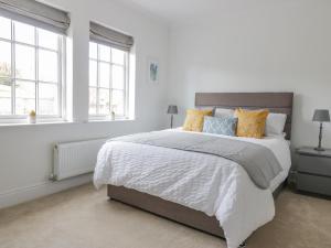 Ένα ή περισσότερα κρεβάτια σε δωμάτιο στο 40 Bowmont Court