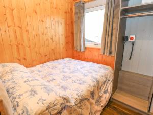 Postel nebo postele na pokoji v ubytování The Cabin