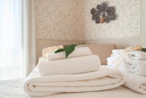 Posteľ alebo postele v izbe v ubytovaní B&B Risveglio col Rosone