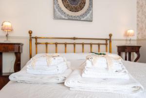 Posteľ alebo postele v izbe v ubytovaní B&B Risveglio col Rosone