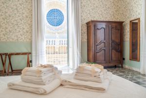 Posteľ alebo postele v izbe v ubytovaní B&B Risveglio col Rosone