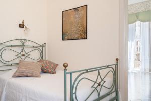 Posteľ alebo postele v izbe v ubytovaní B&B Risveglio col Rosone