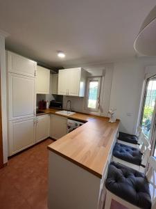 Kuchyň nebo kuchyňský kout v ubytování Apartamento Lagos Azules I + 8 fotografií
