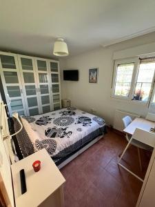 TV a/nebo společenská místnost v ubytování Apartamento Lagos Azules I