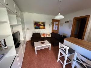TV a/nebo společenská místnost v ubytování Apartamento Lagos Azules I