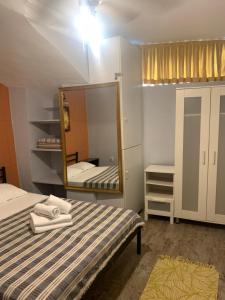 Een bed of bedden in een kamer bij Volare Apart Hotels