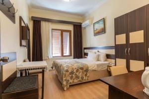 Кровать или кровати в номере Hotel Karacam
