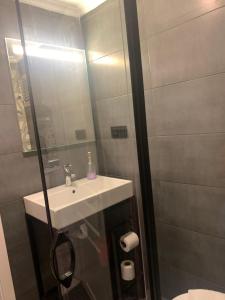 Et badeværelse på Volare Apart Hotels