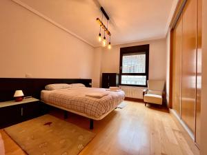 Łóżko lub łóżka w pokoju w obiekcie Atuaire Home Cordón 3 centro Histórico Parking Incluido