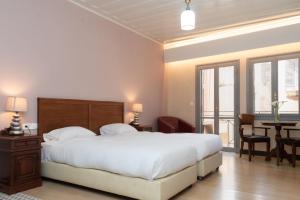 Cama o camas de una habitación en Vranas Ambiance Hotel