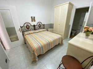 Postel nebo postele na pokoji v ubytování Do 'Zizzia