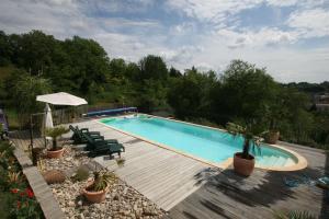 The swimming pool at or close to Sarlat, 600 m à pied du centre historique, maison La Salamandre