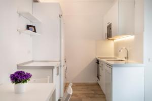 Kuchyňa alebo kuchynka v ubytovaní Alta House Apartments 3 Calas
