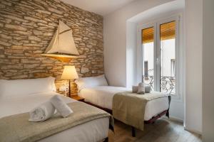 Posteľ alebo postele v izbe v ubytovaní Alta House Apartments 3 Calas