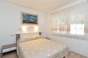 Ένα ή περισσότερα κρεβάτια σε δωμάτιο στο House Fazana 1456