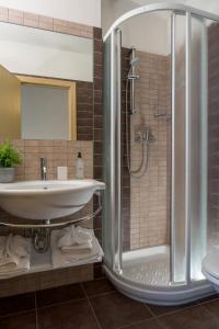 a bathroom with a shower and a sink at Duparc Hotel in Gabicce Mare