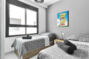 Postel nebo postele na pokoji v ubytování Apartment Diamante 2