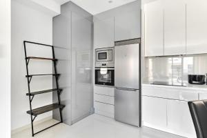 Kuchyň nebo kuchyňský kout v ubytování Apartment Diamante 2