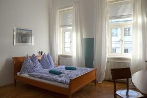 Posteľ alebo postele v izbe v ubytovaní Vienna 1090