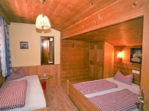 Posteľ alebo postele v izbe v ubytovaní Holiday Home Hexenhäusl by Interhome