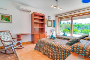Postel nebo postele na pokoji v ubytování Finca SIONA Alcudia by Mallorca Villa Selection