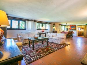A seating area at Apartment Bardeggiano - Caterina 2 - COL245 by Interhome
