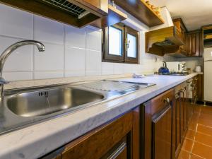 A kitchen or kitchenette at Apartment Bardeggiano - Caterina 2 - COL245 by Interhome