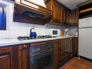 A kitchen or kitchenette at Apartment Bardeggiano - Caterina 2 - COL245 by Interhome