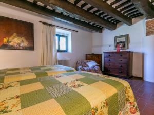 A bed or beds in a room at Apartment Bardeggiano - Caterina 2 - COL245 by Interhome