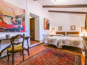 A bed or beds in a room at Apartment Bardeggiano - Caterina 2 - COL245 by Interhome