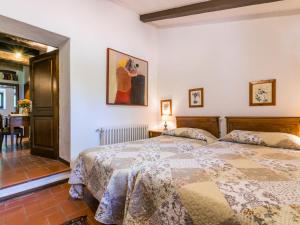 A bed or beds in a room at Apartment Bardeggiano - Caterina 2 - COL245 by Interhome
