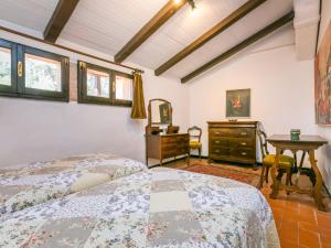 A bed or beds in a room at Apartment Bardeggiano - Caterina 2 - COL245 by Interhome