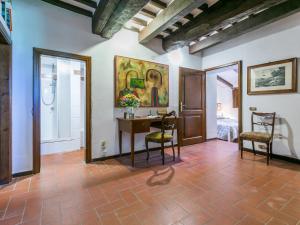 A bed or beds in a room at Apartment Bardeggiano - Caterina 2 - COL245 by Interhome