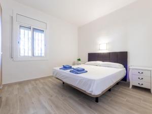 A bed or beds in a room at Holiday Home Cornelia Pucho by Interhome