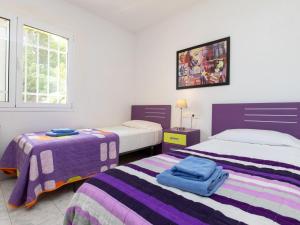 Postel nebo postele na pokoji v ubytování Holiday Home Bella Vista by Interhome