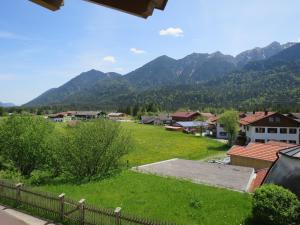 a view of a village with mountains in the background at Apartment Flösserstrasse by Interhome in Wallgau