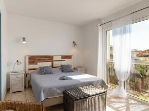 Postel nebo postele na pokoji v ubytování Holiday Home Villa Marine by Interhome