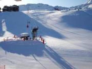 a snow covered slope with a ski lift in the distance at Studio a La Plagne Tarentaise a 300 m des pistes avec balcon amenage et wifi in La Plagne Tarentaise