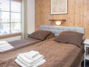 Postel nebo postele na pokoji v ubytování Holiday Home Rukatonttu d 13 by Interhome + 19 fotografií