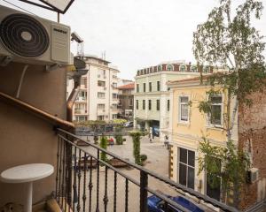 a balcony with a speaker on the side of a building at ALEKS Top Center in Burgas