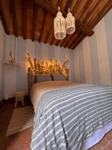 Tempat tidur dalam kamar di Borgo Al Canto Degli Alberi