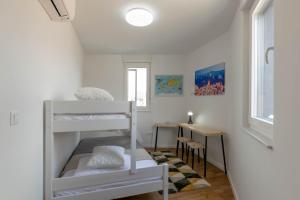 Postel nebo postele na pokoji v ubytování Empress apartment