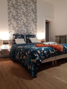 Postel nebo postele na pokoji v ubytování Grande maison de ville entre terre et mer