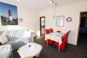 Posezení v ubytování Haus Dithmarschen Wohnung 1